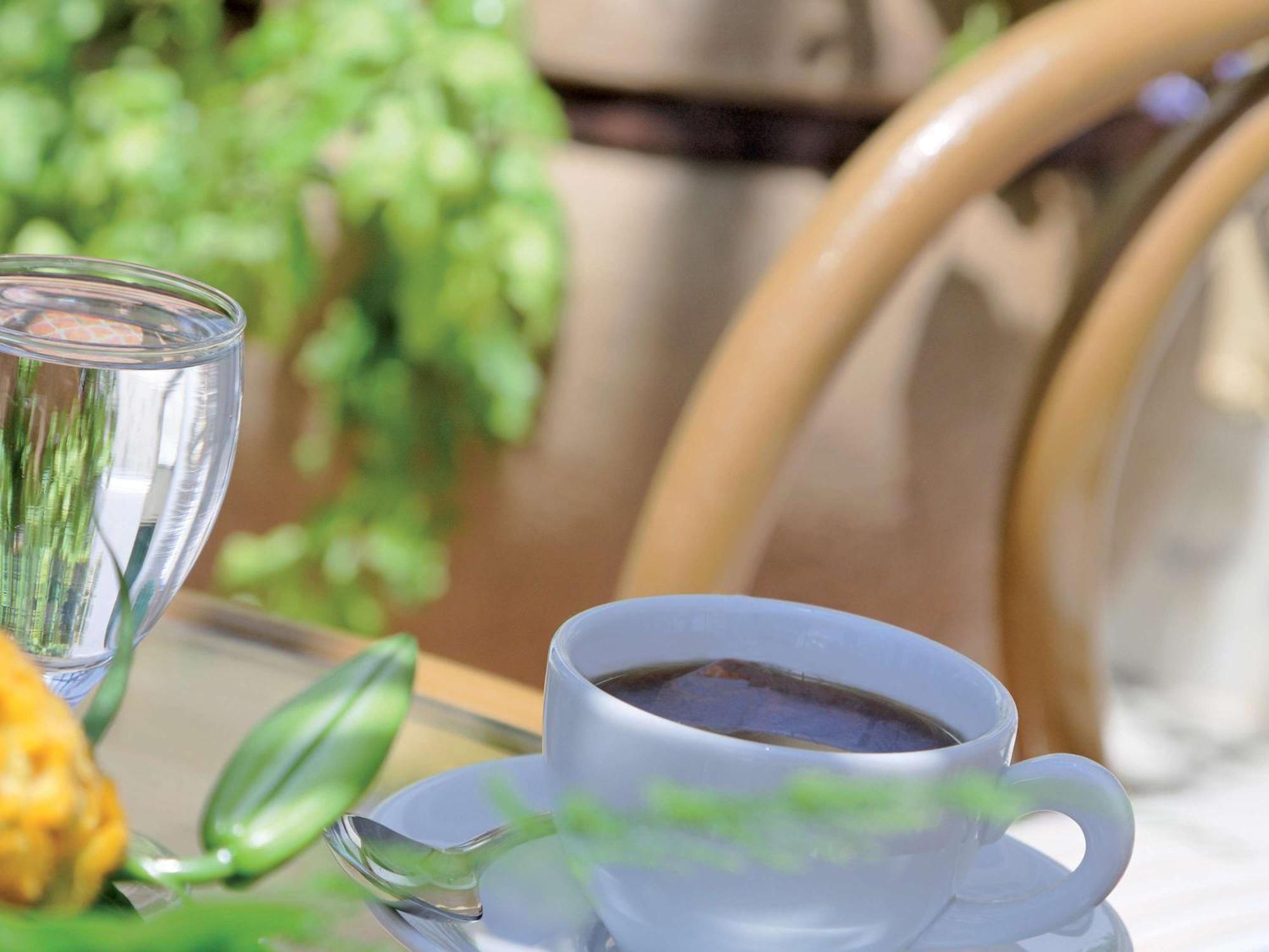 Moevenpick Hotel Cairo - Media City Giza Екстериор снимка A cup of coffee